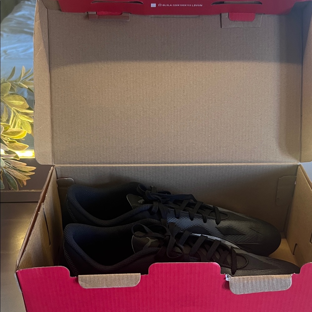 Unisex Black Puma Athletic Shoes with Molded Studs